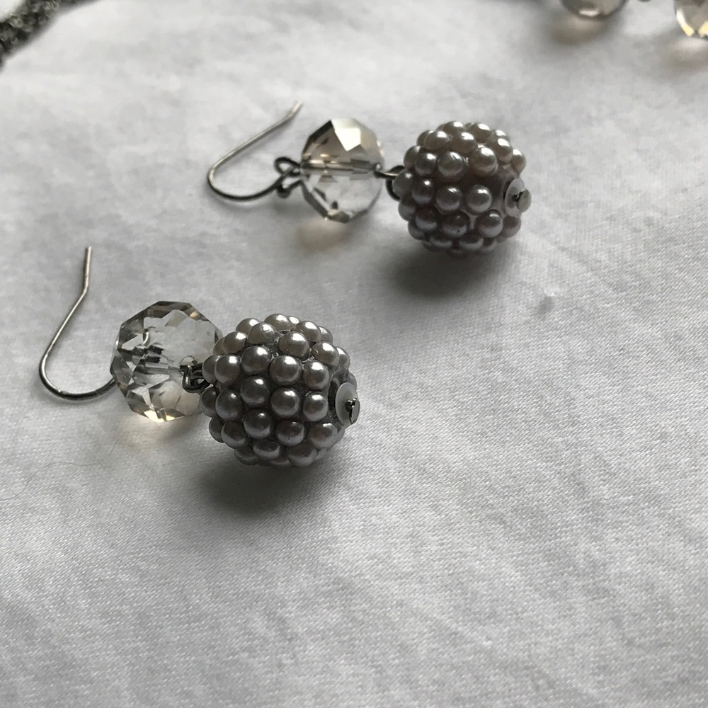 Matching black and silver earrings